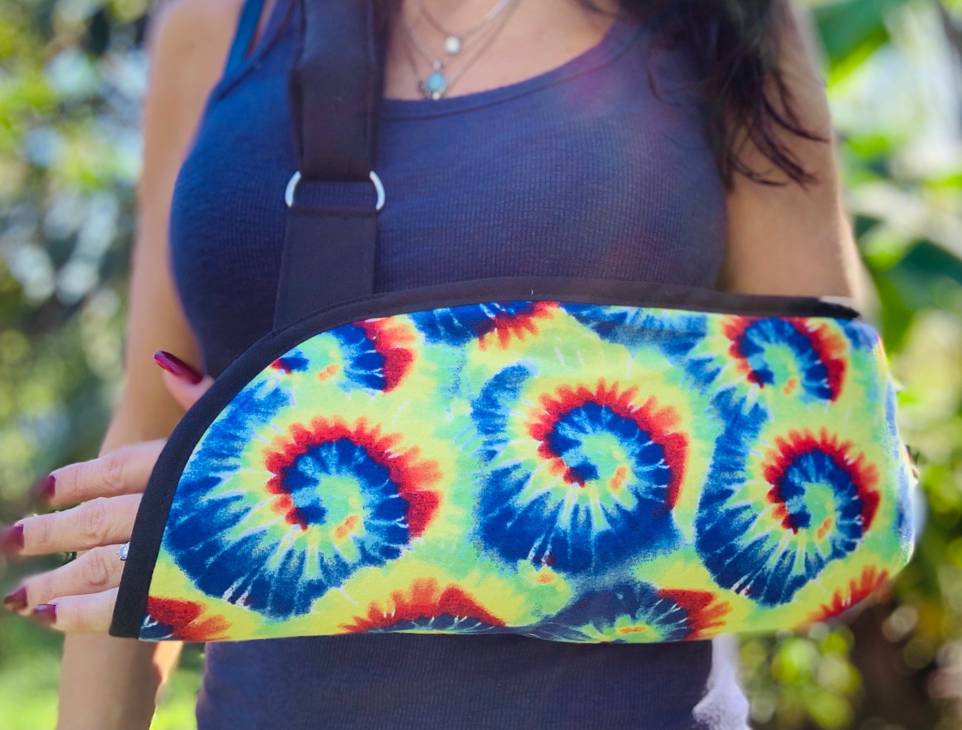 groovy tie dye primary color arm sling with black trim