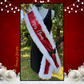 Add a festive touch to your holiday look with this vibrant red sequin “Mrs. Claus” sash! Trimmed in soft, white faux fur for a cozy, wintery feel, this sash catches the light with every step. A chic black satin bow with a gold accent adds a pop of elegance, completing the classic Christmas-inspired design.