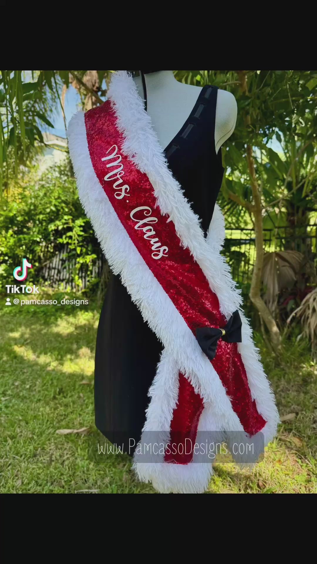 Add a festive touch to your holiday look with this vibrant red sequin “Mrs. Claus” sash! Trimmed in soft, white faux fur for a cozy, wintery feel, this sash catches the light with every step. A chic black satin bow with a gold accent adds a pop of elegance, completing the classic Christmas-inspired design.