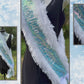 Make any celebration unforgettable with our Ice Blue Iridescent Sequin Sash! This dazzling sash features shimmering ice blue sequins that catch the light beautifully, giving it a magical glow. Trimmed with soft white faux fur for a touch of elegance, it’s adorned with ‘Birthday Princess’—or personalized with a custom message for that extra-special touch. Finished with a classic white satin bow closure, this sash is perfect for birthdays, photoshoots, or any occasion where you want to feel like royalty